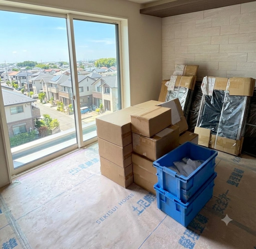 有田屋が住宅リフォーム現場で段ボール資材を搬入する様子